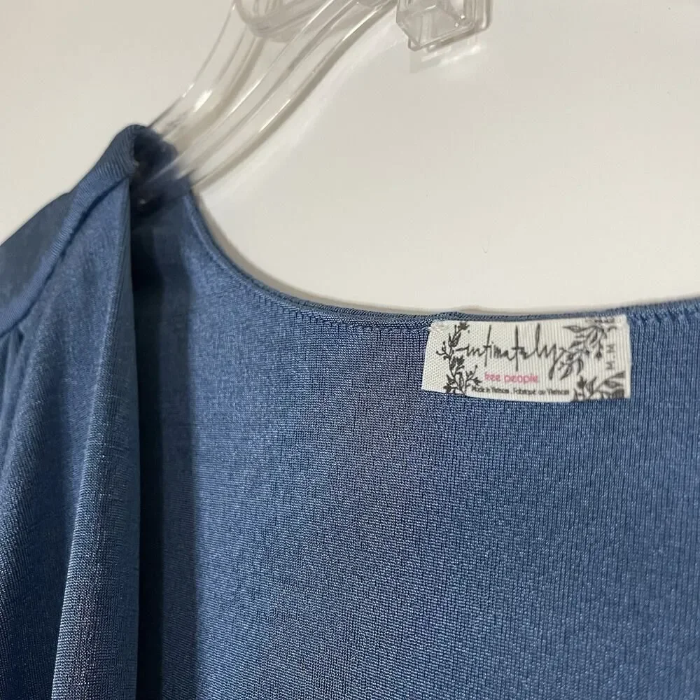 Free People intimately turnt sheen blue long sleeve plunge bodysuit Medium